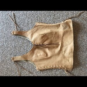 Leather braid tooling down sides and at chest